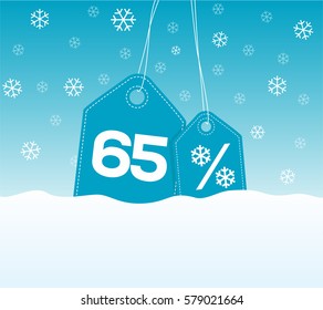 Blue hanging price tag labels with 65% and snowflake percent design texts on them on snow background. For winter sale campaigns.