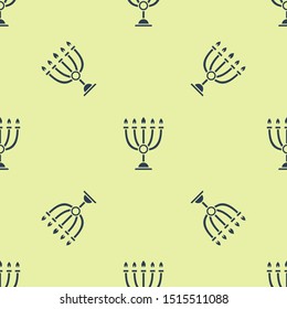 Blue Hanukkah menorah icon isolated seamless pattern on yellow background. Hanukkah traditional symbol. Holiday religion, jewish festival of Lights.  Vector Illustration