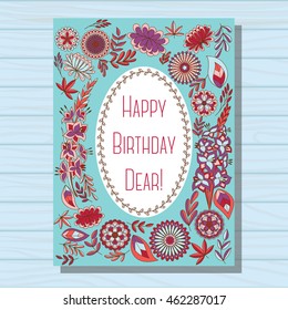 Blue happy birthday dear card on wooden background