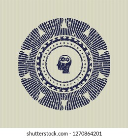 Blue head with gears inside icon inside distress rubber grunge stamp