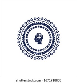 Blue head with gears inside icon inside distressed rubber seal with grunge texture