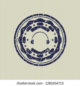 Blue headphones icon inside grunge style stamp