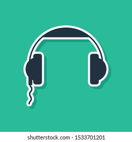 Blue Headphones icon isolated on green background. Earphones sign. Concept for listening to music, service, communication and operator.  Vector Illustration