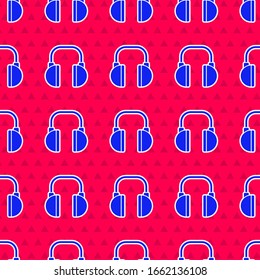 Blue Headphones icon isolated seamless pattern on red background. Earphones. Concept for listening to music, service, communication and operator.  Vector Illustration
