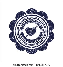 Blue heart with arrow icon inside distress rubber seal with grunge texture