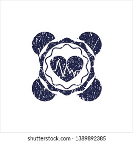 Blue heart with electrocardiogram icon inside rubber stamp with grunge texture