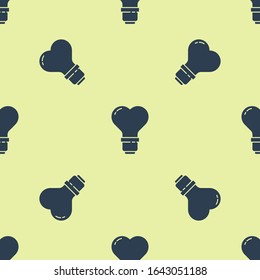 Blue Heart shape in a light bulb icon isolated seamless pattern on yellow background. Love symbol. Valentine day symbol.  Vector Illustration