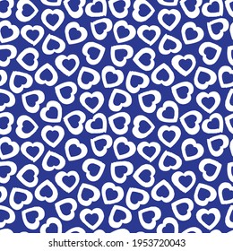 Blue Heart shaped brush stroke seamless pattern background for fashion textiles, graphics