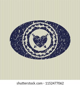 Blue heart with two arrows icon inside distressed rubber grunge texture stamp