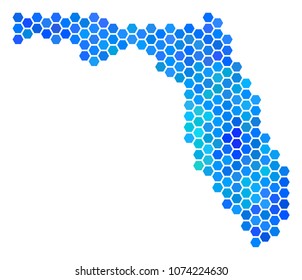 Blue Hexagon Florida Map. Vector geographic map in blue color tinges on a white background. Blue vector collage of Florida Map composed of hexagonal elements.
