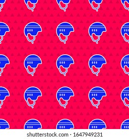 Blue Hockey helmet icon isolated seamless pattern on red background.  Vector Illustration