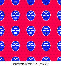 Blue Hockey mask icon isolated seamless pattern on red background.  Vector Illustration