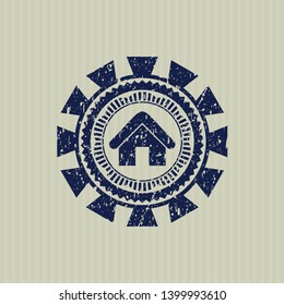 Blue home icon inside distressed rubber seal