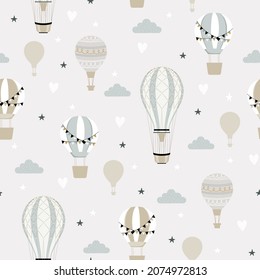 Blue hot air ballon and clouds seamless childish pattern. Hand drawn repeat pattern for wrapping, fabrik, textile or paper projects. Vector illustration.   