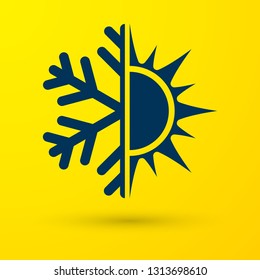 Blue Hot and cold symbol. Sun and snowflake icon isolated on yellow background. Winter and summer symbol. Vector Illustration