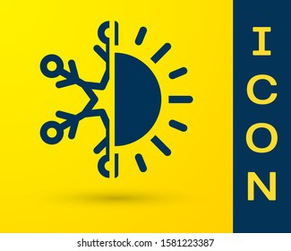 Blue Hot and cold symbol. Sun and snowflake icon isolated on yellow background. Winter and summer symbol.  Vector Illustration