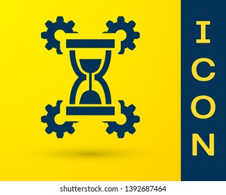 Blue Hourglass and gear icon isolated on yellow background. Time Management symbol. Clock and gear icon. Productivity symbol. Vector Illustration