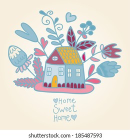 blue house and flowers