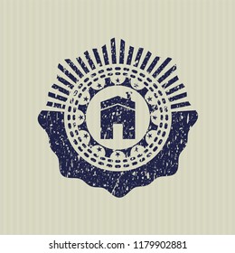 Blue house icon inside rubber seal