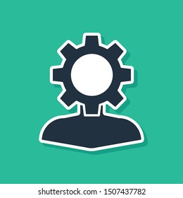 Blue Human with gear inside icon isolated on green background. Artificial intelligence. Thinking brain sign. Symbol work of brain.  Vector Illustration