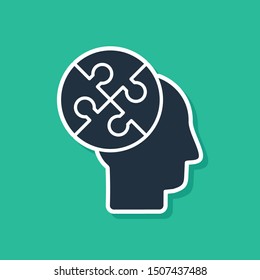 Blue Human head puzzles strategy icon isolated on green background. Thinking brain sign. Symbol work of brain.  Vector Illustration