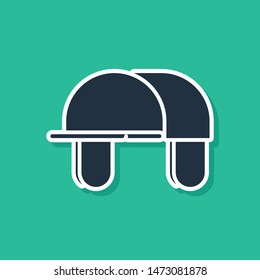 Blue Hunter hat icon isolated on green background. Plaid winter hat.  Vector Illustration