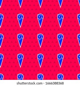 Blue Ice cream in waffle cone icon isolated seamless pattern on red background. Sweet symbol.  Vector Illustration