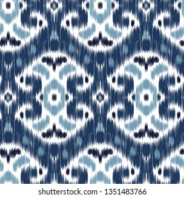 Blue Ikat Ogee and Damascus ornament Seamless Background Pattern In the style of the Tapestry. Abstract background for textile design, wallpaper, surface textures