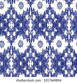 Blue Ikat Ogee Seamless Background Pattern. Abstract background for textile design, wallpaper, surface textures