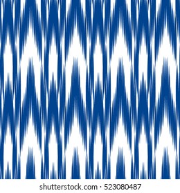 Blue Ikat Ogee Seamless Background Pattern. Abstract background for textile design, wallpaper, surface textures.