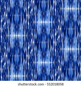 Blue Ikat Ogee Seamless Background Pattern. Abstract background for textile design, wallpaper, surface textures.