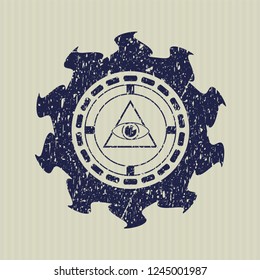 Blue illuminati pyramid icon inside distressed rubber stamp
