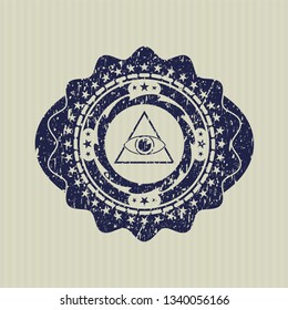 Blue illuminati pyramid icon inside rubber texture