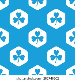 Blue image of clover in white hexagon, repeated on blue