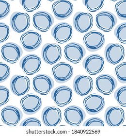 Blue ink circles isolated on white background. Monochrome geometric seamless pattern. Vector flat graphic hand drawn illustration. Texture.