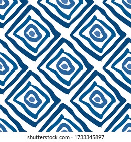 Blue ink rhombuses and squares isolated on white background. Geometric seamless pattern. Hand drawn vector graphic illustration. Texture.