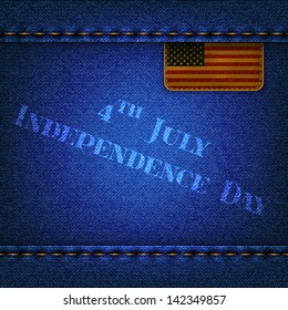 Blue jeans background with leather flag and the inscription Independence Day