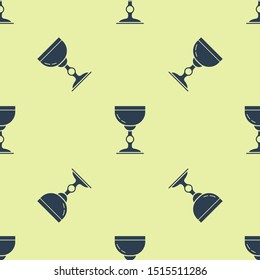 Blue Jewish goblet icon isolated seamless pattern on yellow background. Jewish wine cup for kiddush. Kiddush cup for Shabbat.  Vector Illustration