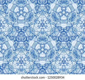Blue kaleidoscope seamless pattern, background. Composed of abstract and geometric shapes. Useful as design element for texture and artistic compositions.