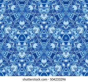 Blue kaleidoscope seamless pattern. Composed of color abstract shapes. Useful as design element for texture and artistic compositions.