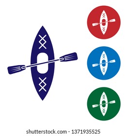 Blue Kayak and paddle icon isolated on white background. Kayak and canoe for fishing and tourism. Outdoor activities. Set color icon in circle buttons. Vector Illustration