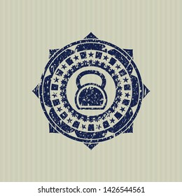 Blue kettlebell icon inside rubber stamp with grunge texture