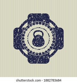 Blue kettlebell icon inside rubber grunge texture stamp. 