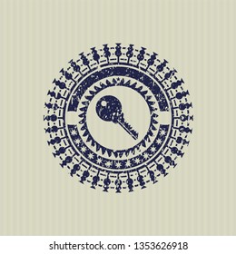 Blue key icon inside distress rubber seal with grunge texture