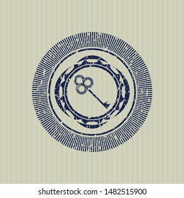 Blue key icon inside distress rubber grunge seal