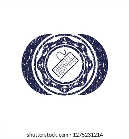 Blue keyboard icon inside distress rubber grunge stamp