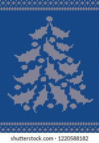 blue knitted pattern with a Christmas tree