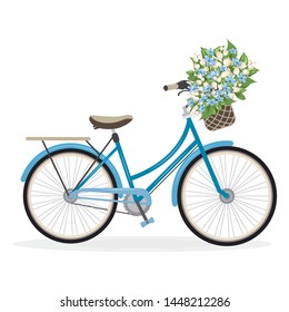 A blue lady bicycle with a flower basket
