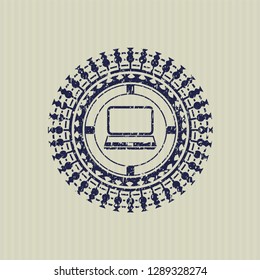 Blue laptop icon inside distressed rubber grunge stamp