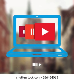 Blue Laptop Symbol with Red Start, Stop, Play Icons, Blurred Photo Background (Town Street Panorama)